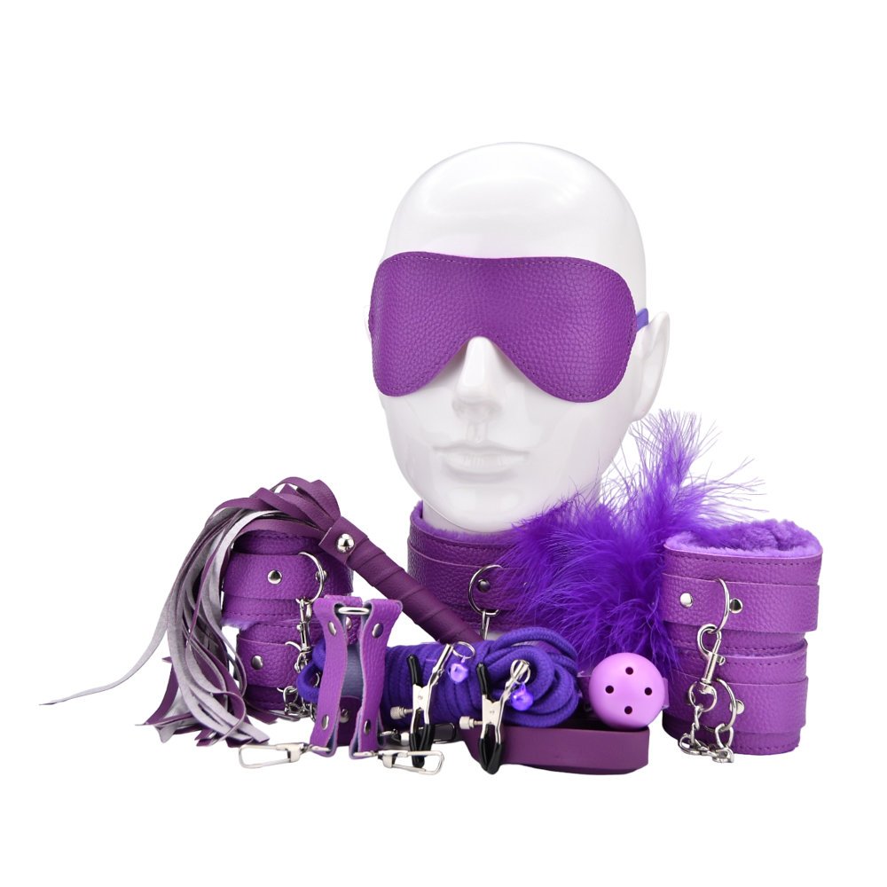 purple bondage kit with blindfold, cuffs, ball gag, feather tickler, rope, collar, and restraints