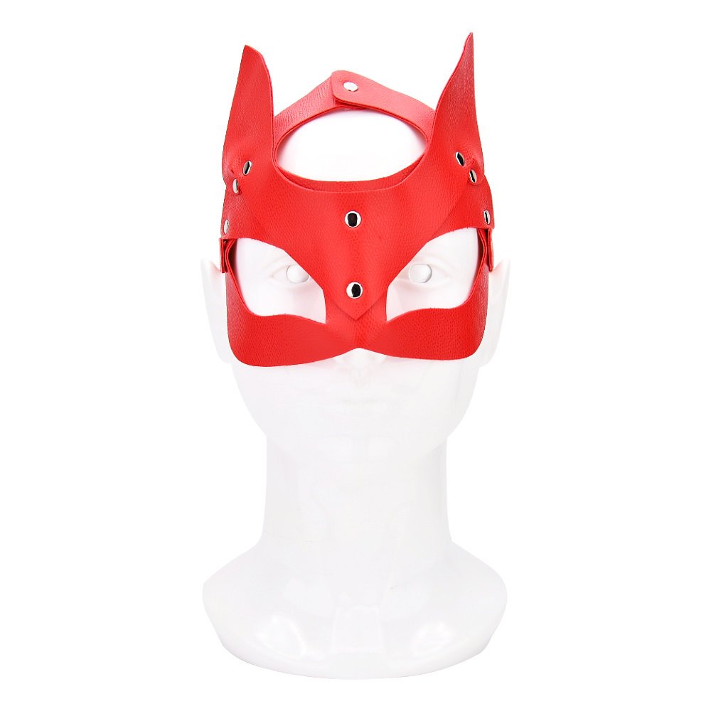 red kitty cat face mask with pointed ears and metal rivets, displayed on mannequin head